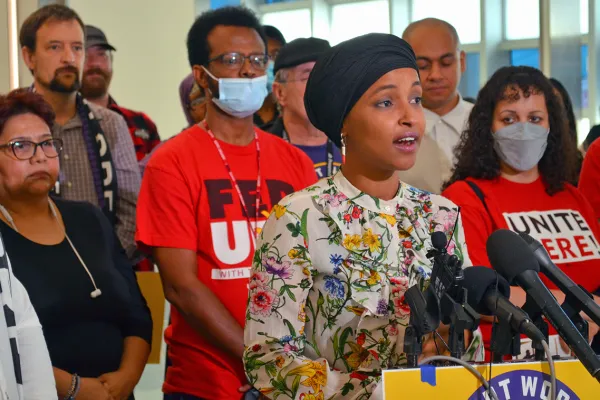 Photo of Rep. Ilhan Omar with workers - photo by the St. Paul Union Advocate